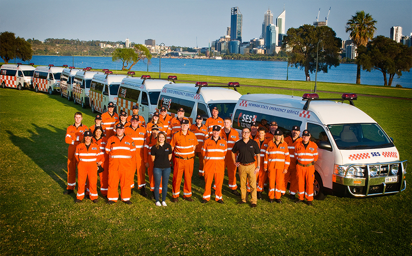 A fleet of commuter buses ferry personnel to and from fire grounds. Image: Gordon Hall